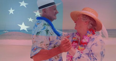 Elderly Couple Dancing Joyfully on Tropical Beach Vacation