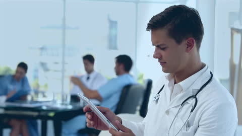 Doctor Analyzing Data on Tablet in Hospital Setting