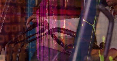 Warehouse Worker Operates Machinery Amid Financial Graph Overlay