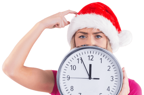 festive woman in santa hat pointing at large wall clock isolated on transparent background - Download Free Stock Videos Pikwizard.com