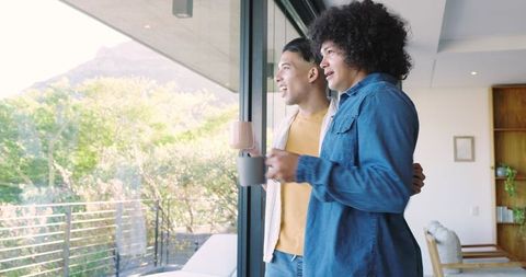 Men Enjoying Morning Coffee with Scenic View