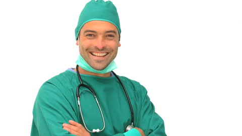 Smiling Surgeon in Green Scrubs with Stethoscope