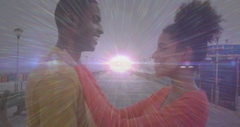 Romantic Couple Enjoying Sunset on Seaside Pier