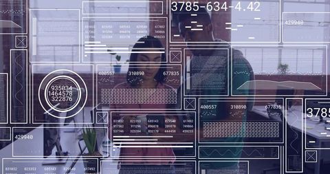 Two colleagues analyzing futuristic data dashboards and analytics overlays in modern office