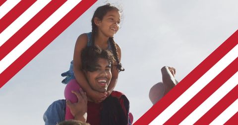 Biracial Father Sharing Joyful Moment with Daughter