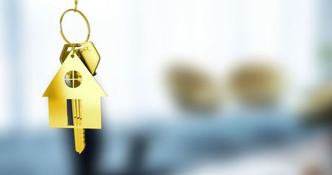 Luxurious Gold House Keychain with Key on Elegant Keyring