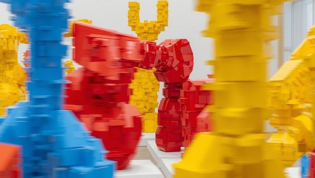 Vibrant abstract geometric sculpture installation in gallery