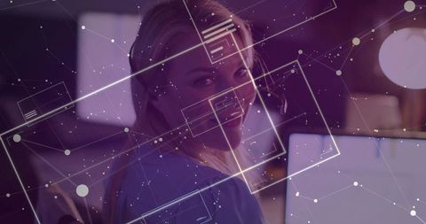 Communication Expert Monitoring Digital Network in Modern Office