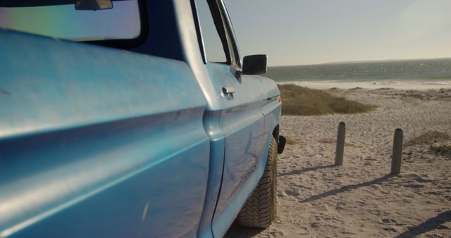 Vintage Blue Truck Parked by Beachfront Sand Dunes on Sunny Day - Download Free Stock Images Pikwizard.com