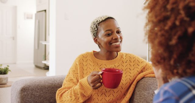 Woman Having Coffee and Chatting in Cozy Living Room - Download Free Stock Images Pikwizard.com