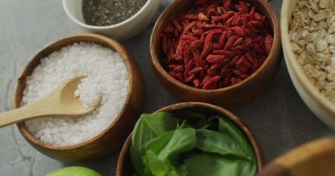 Healthy Plant-Based Ingredients on Kitchen Counter with Fresh Herbs and Spices