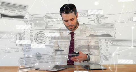 Businessman Using Smartphone and Checking Augmented Data Overlays at Desk