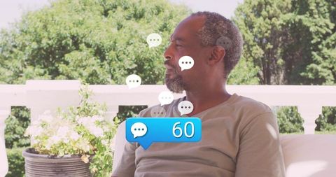 Senior man enjoying tranquil moment with social media interaction