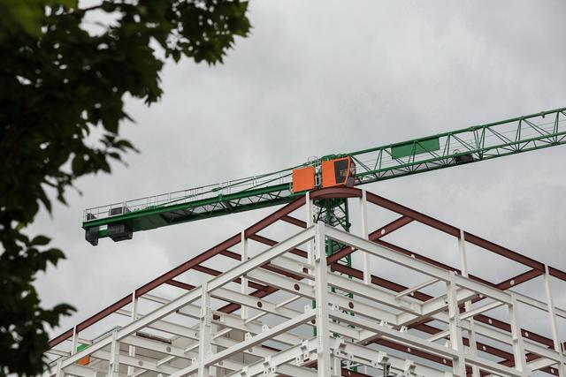Crane Overseeing Steel Framework at Construction Site - Download Free Stock Photos Pikwizard.com