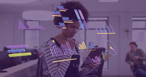 Businesswoman Analyzing Financial Data Projections at Work