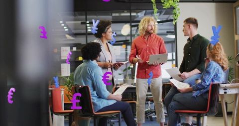 Diverse team analyzing budget with global currency symbols