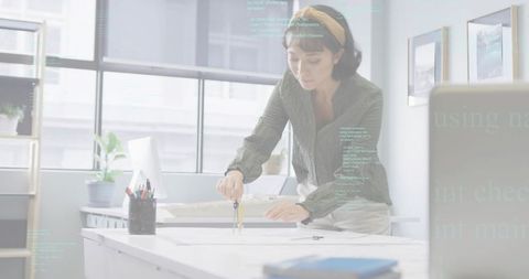 Architect Making Precise Measurements with Compass in Office