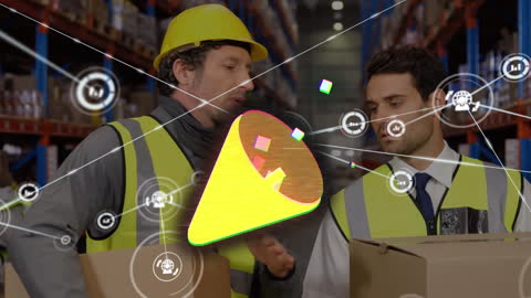 Diverse Warehouse Workers Analyzing Digital Interface