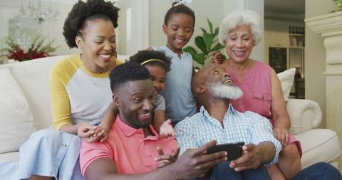 Happy Multi-Generational African American Family Enjoying Togetherness