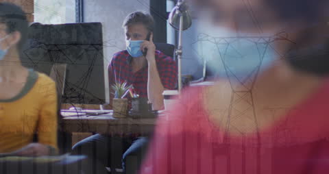 Office Workers Collaborating During Pandemic with Graphic Overlay