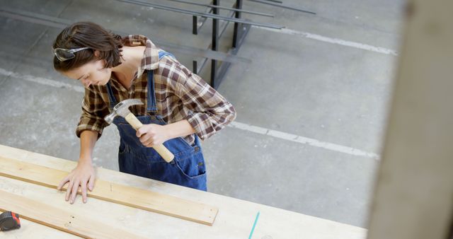 Young Woman Engaging in Carpentry Workshop Projects - Download Free Stock Images Pikwizard.com