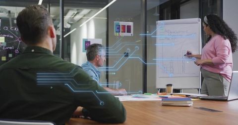 Professional Brainstorming Session in Modern Office with Digital Overlay