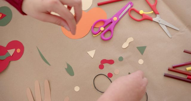 Crafting with Paper Cutouts and Colorful Scissors on Table - Download Free Stock Images Pikwizard.com