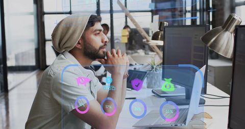 Focused entrepreneur analyzing financial data with innovative tools