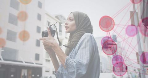 Hijab-Wearing Woman Capturing Urban Moments with Network Overlay