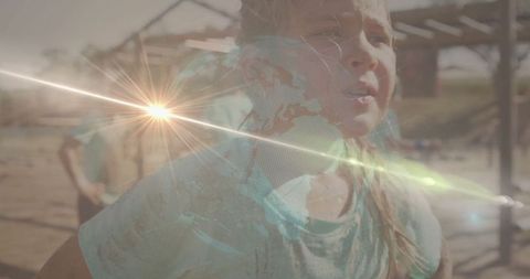 Girl Participating in Outdoor Obstacle Race with Digital Globe Overlay