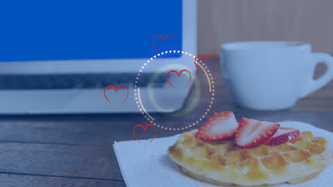 Digital Love Concept with Laptop and Waffle Hearts Overlay