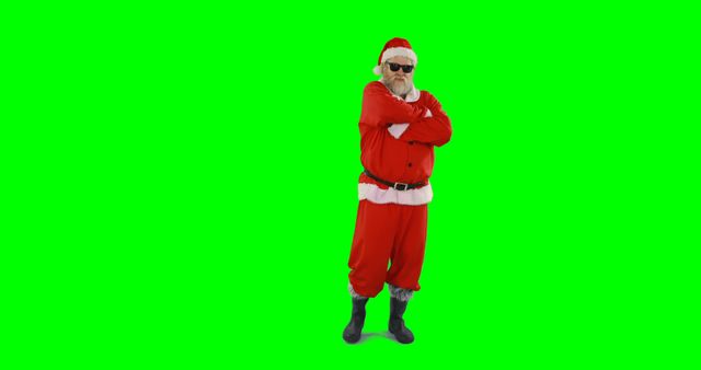 Cool Santa Claus Standing Confidently in Sunglasses on Green Background - Download Free Stock Images Pikwizard.com
