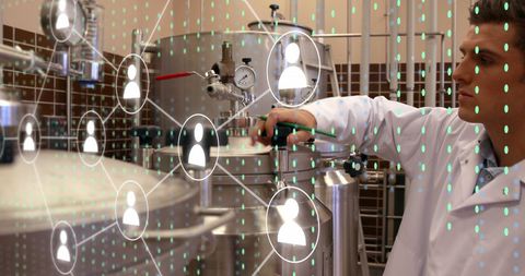 Scientist Analyzing Digital Data Interface in Brewery