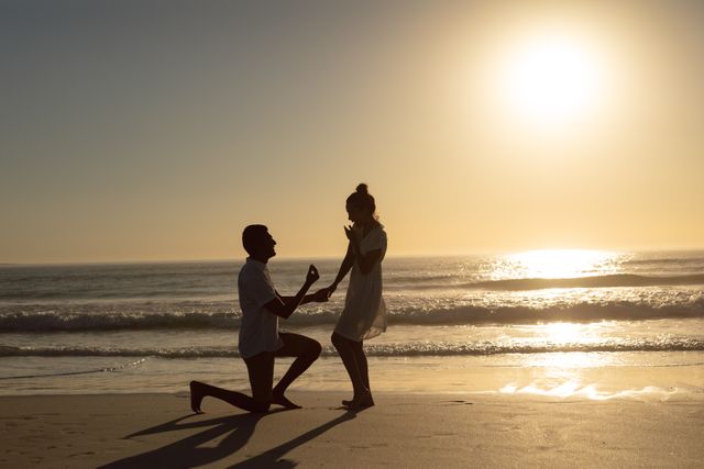 Romantic Beach Proposal at Sunset - Download Free Stock Photos Pikwizard.com