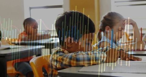 Focused Students Engaging with Worksheets in Bright Classroom