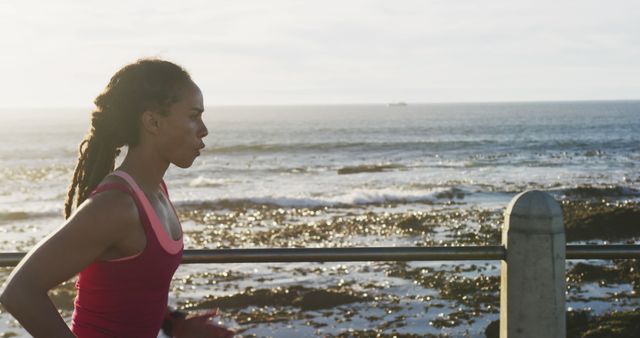 Young Woman Running Along Beach at Sunrise for Fitness and Wellness - Download Free Stock Images Pikwizard.com