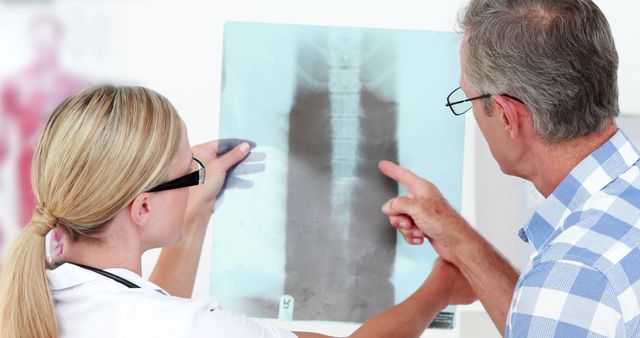 Doctor and Patient Discussing Spine X-Ray Results - Download Free Stock Images Pikwizard.com