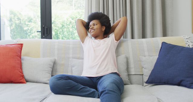 Relaxed Woman Sitting on Couch at Home - Download Free Stock Images Pikwizard.com