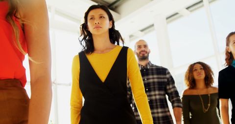 Diverse group of young adults in casual professional environment