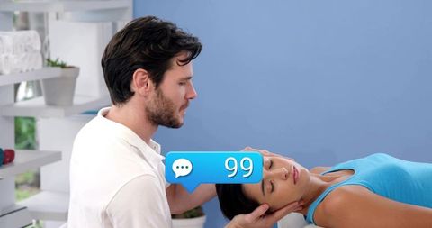 Chiropractor Performing Gentle Neck Adjustment on Relaxed Woman in Wellness Clinic