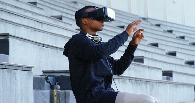 Man Using Virtual Reality Headset in Urban Environment - Download Free Stock Photos Pikwizard.com