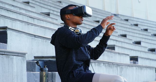 Man Using Virtual Reality Headset in Urban Environment - Download Free Stock Images Pikwizard.com