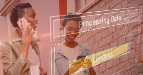 Women engaged with technology and data processing overlay