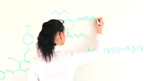 Female Scientist Writing Complex Formula on Whiteboard
