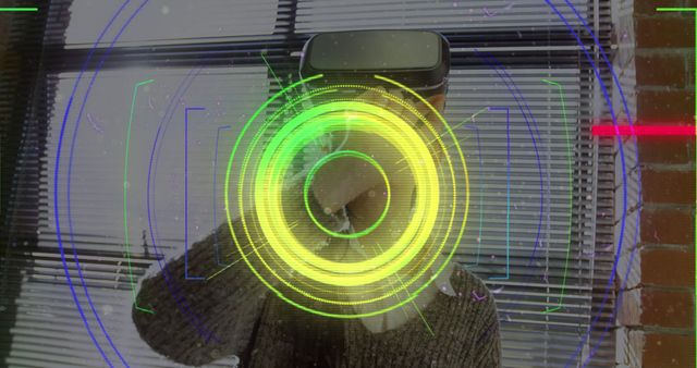 Light trails over scope scanner against asian woman gesturing while wearing vr headset at office. computer interface and technology concept