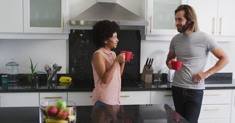 Happy Couple Enjoying Coffee Together in Modern Kitchen - Download Free Stock Images Pikwizard.com