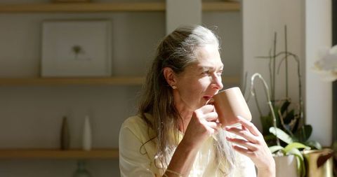 Serene Senior Woman Enjoying Morning Coffee - Download Free Stock Images Pikwizard.com