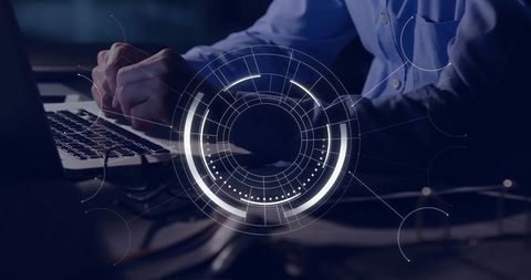 Technology Enthusiast Typing with Futuristic Interface Overlay