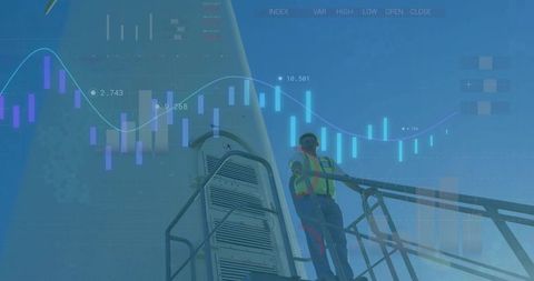 Worker Overseeing Wind Farms with Integrated Financial Chart