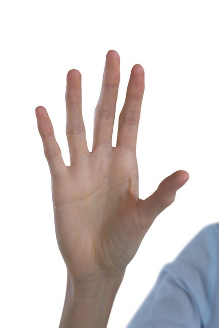 This image shows a woman's hand interacting with an invisible screen against a white background. It can be used to illustrate concepts related to technology, digital interfaces, virtual interactions, and modern communication. Ideal for websites, presentations, and marketing materials focusing on innovative tech solutions and user interface design.